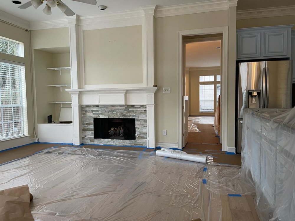 Interior painting project with floors and furnishings protected